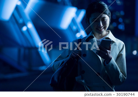 Business woman using mobile phone, directions, navi, application 30190744