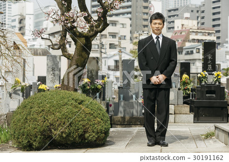 a visit to a grave  30191162