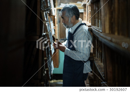 Men in craftwork warehouse 30192607