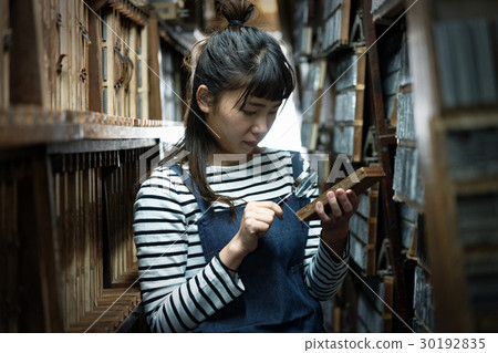 A woman in a craftwork warehouse A woman in a craftwork warehouse 30192835