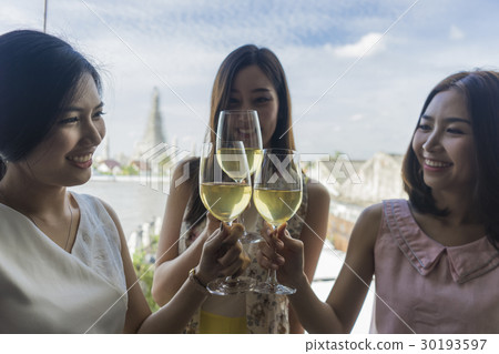 Girlfriends' celebration with champagne in luxury restaurant. 30193597