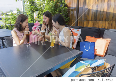 Happy time of ladies with presents in restaurant Happy time of ladies with presents in restaurant 30193698
