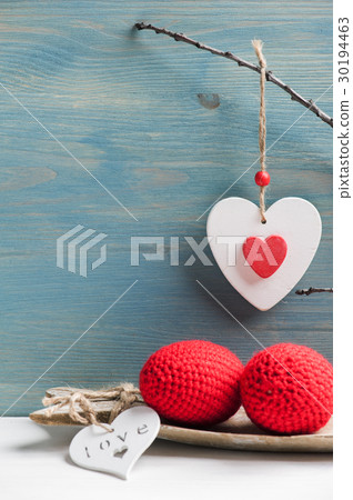 Red crocheted easter eggs in a shabby wooden box Red crocheted easter eggs in a shabby wooden box 30194463