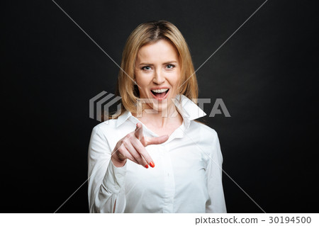 Joyful woman expressing happiness in the black Joyful woman expressing happiness in the black 30194500