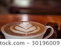 Cup of coffee with beautiful Latte art 30196009