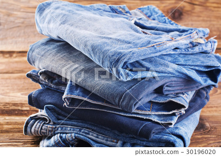 jeans on a wooden plate 30196020