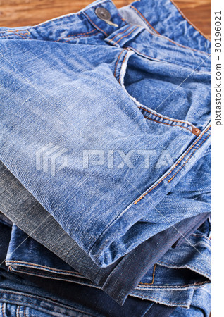 jeans on a wooden plate jeans on a wooden plate 30196021