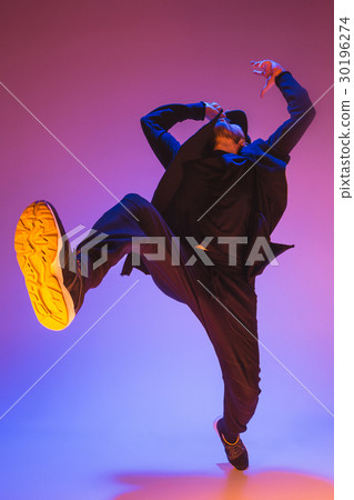 The silhouette of one hip hop male break dancer 30196274