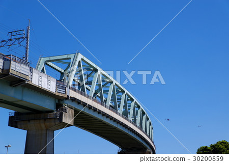 鐵路橋JR Yume nojima橋從西側出發的直升機和在客機內的遠攝 鐵路橋JR Yume nojima橋從西側出發的直升機和在客機內的遠攝 30200859