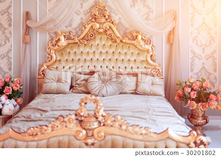 Luxury bedroom in light colors with golden Luxury bedroom in light colors with golden 30201802