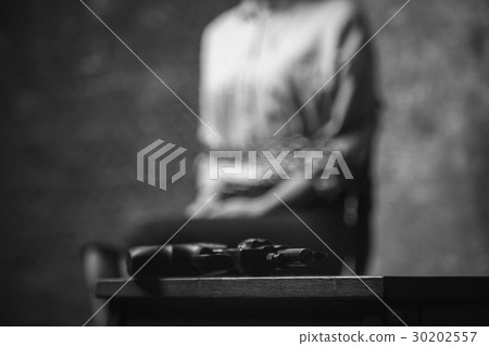Abducted clueless victim sitting tied up to a 30202557