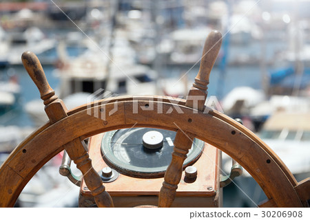 Captains steering wheel of an old wooden sailing  30206908