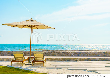 Umbrella and chair with sea view 30214679