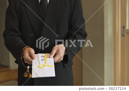 a visit to a grave  30217124