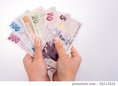 Hand holding Turksh Lira banknotes  in hand 30217829