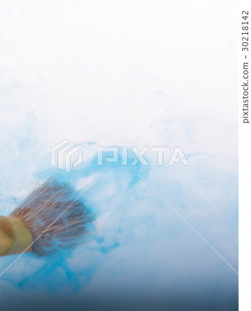 Watercolor paint dissolving in water Watercolor paint dissolving in water 30218142
