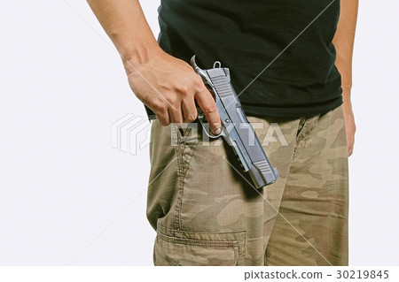 Man holding a gun. Man holding a gun. 30219845