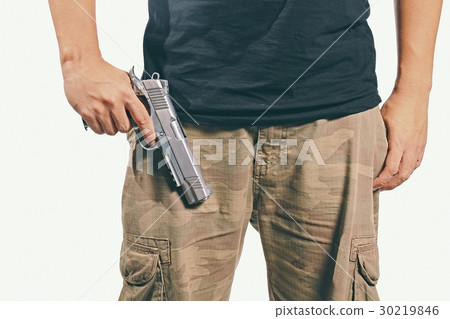 Man holding a gun. Man holding a gun. 30219846