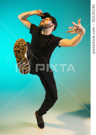 The silhouette of one hip hop male break dancer The silhouette of one hip hop male break dancer 30226140