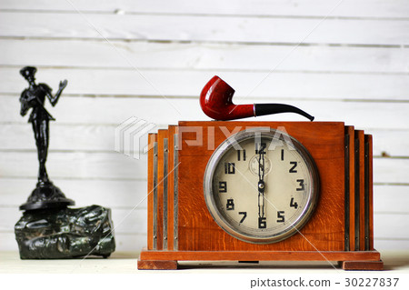 old clock and smoking pipe old clock and smoking pipe 30227837
