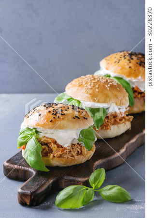 Homemade mini burgers with pulled chicken Homemade mini burgers with pulled chicken 30228370