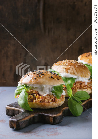 Homemade mini burgers with pulled chicken Homemade mini burgers with pulled chicken 30228373