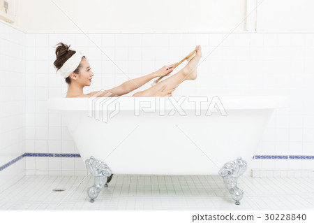 A young lady in bath 30228840