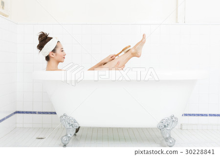 A young lady in bath 30228841