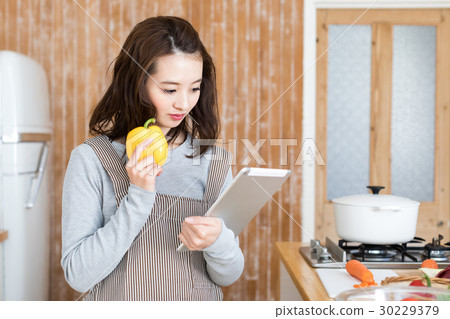 A young woman thinking about menu · Lifestyle 30229379