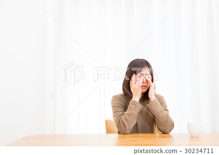 Tired eyes Astigmatism Eyes hurt Negative image Female portrait 20's 30's Tired eyes Astigmatism Eyes hurt Negative image Female portrait 20's 30's 30234711