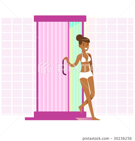 Attractive woman tanning in solarium. Colorful Attractive woman tanning in solarium. Colorful 30236256