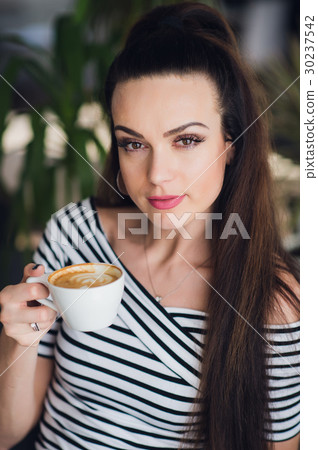 Close up portrait of beautiful but a bit tired Close up portrait of beautiful but a bit tired 30237542