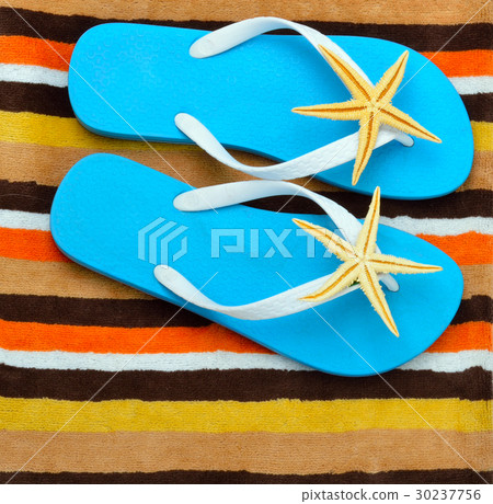 Flip flops with starfish and water droplets. Flip flops with starfish and water droplets. 30237756