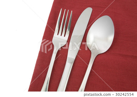 fork and knife on red napkin isolated fork and knife on red napkin isolated 30242554