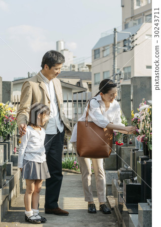 a visit to a grave  30243711