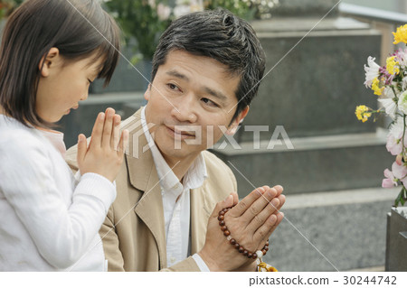 a visit to a grave  30244742