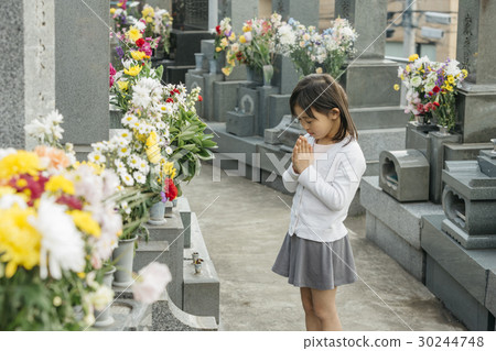 a visit to a grave  30244748