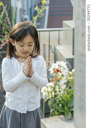 a visit to a grave  30244751