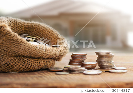 Coins in sack for money saving financial concept 30244817