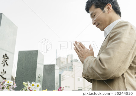 a visit to a grave  30244830