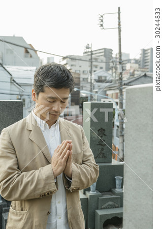 a visit to a grave  30244833