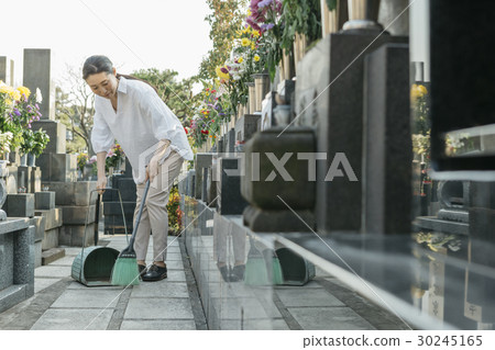 a visit to a grave  30245165