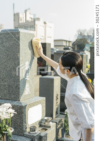 a visit to a grave  30245171