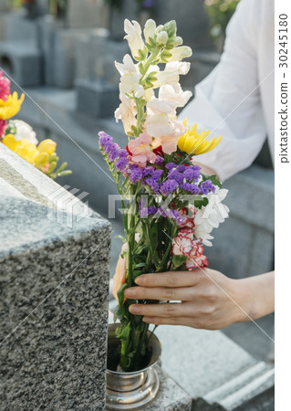 a visit to a grave  30245180