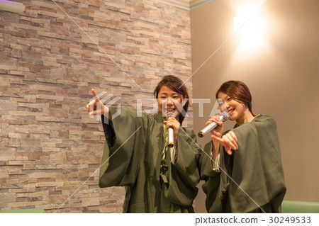 Two women enjoying karaoke in hot spring yukata Two women enjoying karaoke in hot spring yukata 30249533