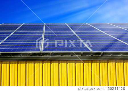Solar panel on a roof of commercial warehouse 30251428