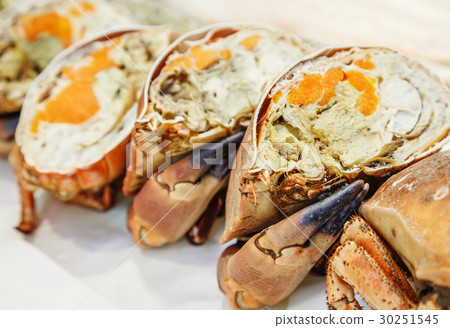 half of fresh crab on ice for sale  30251545