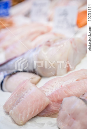 Fresh monkfish fillet on ice for sale at market 30251554
