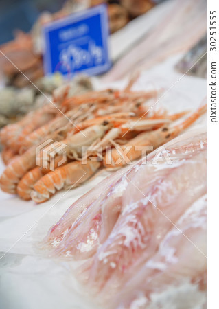 Fresh cod fillet and lobsters on seafood market. 30251555