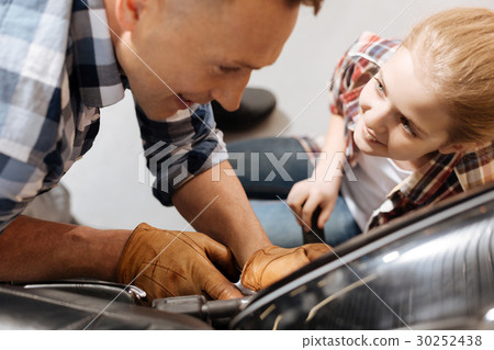 Engaged girl looking at her dad fascination 30252438